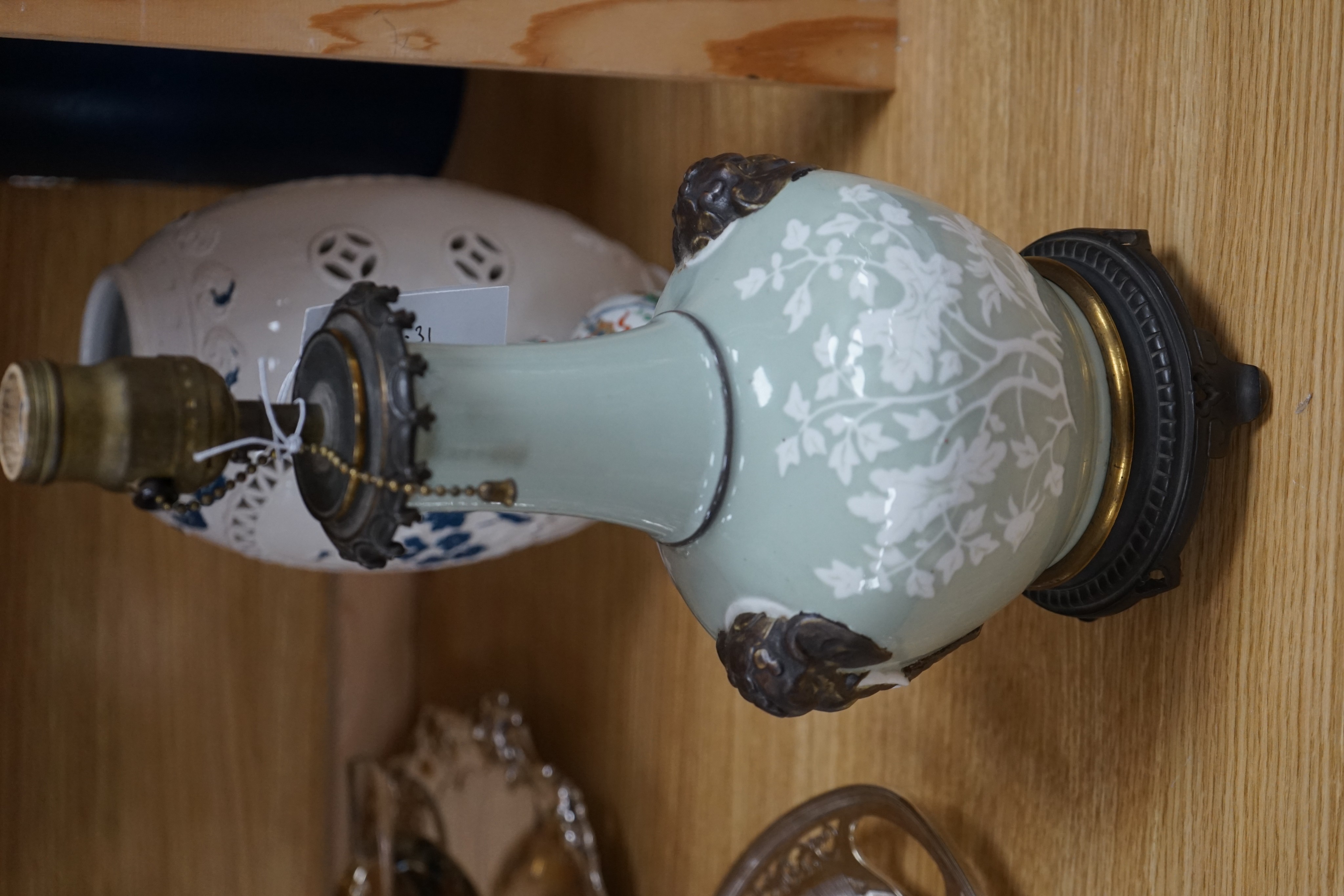Four Chinese porcelain vases, one mounted as a lamp, 35cm